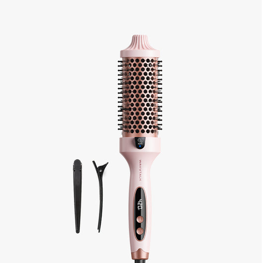 Pink hair styling tool with digital display on a white background