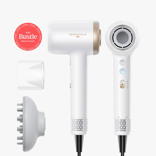 White hair dryer with attachments on a white background, featuring the Bustle Beauty Awards badge.